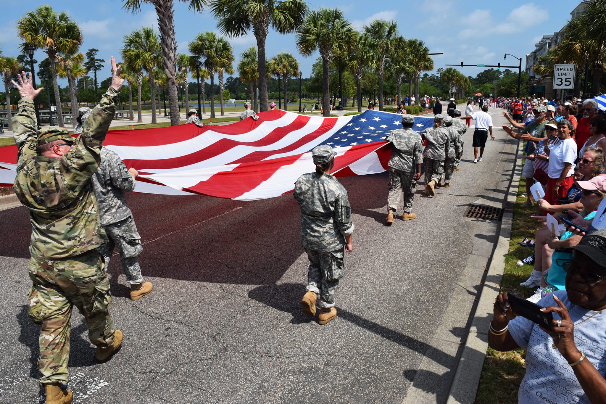 soldiers holding flag