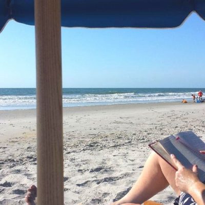 Reading a Book on the Beach